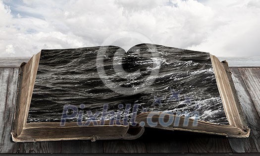 Book with natural sea landscape on pages Book with natural sea landscape on pages