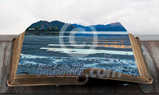 Book with natural landscape on pages. Mixed media Book with natural landscape on pages. Mixed media