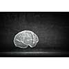 Human brain shadow sign on concrete wall