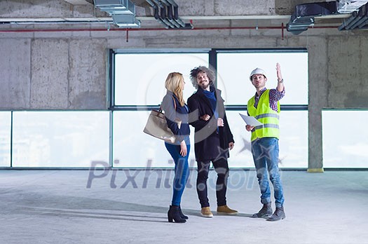 young team of business people in group, architect and engineer on construction site checking documents and business workflow using laptop computer in new startup office young team of business people in group, architect and engineer on construction site checking documents and business workflow using laptop computer in new startup office