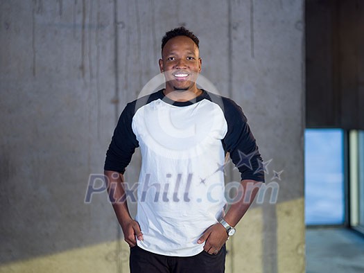 portrait of young african american male architect on construction site while checking documents and business workflow in new startup office portrait of young african american male architect on construction site while checking documents and business workflow in new startup office