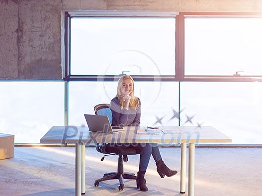 portrait of young female architect on construction site checking documents and business workflow using laptop computer in new startup office portrait of young female architect on construction site checking documents and business workflow using laptop computer in new startup office