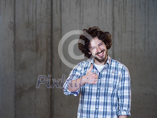 portrait of young male architect on construction site while checking documents and business workflow in new startup office portrait of young male architect on construction site while checking documents and business workflow in new startup office