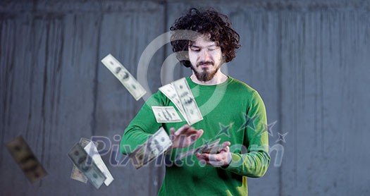 business, people and finances concept Happy young businessman throwing US dollar banknotes and enjoying while making the rain of money in new startup office business, people and finances concept Happy young businessman throwing US dollar banknotes and enjoying while making the rain of money in new startup office