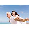 Couple having fun on the beach
