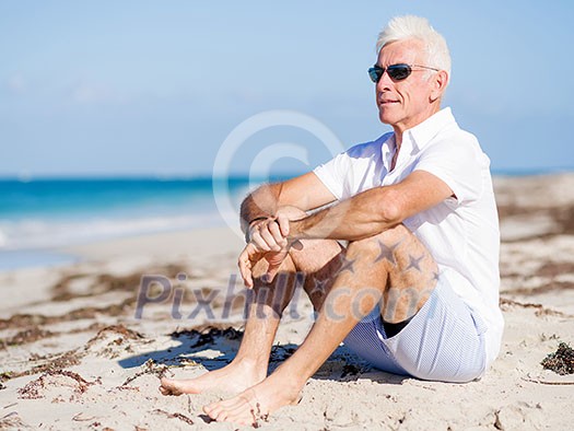 Handsome man on the beach Handsome man on the beach