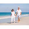 Couple walking on the beach