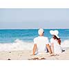 Couple sitting on the beach