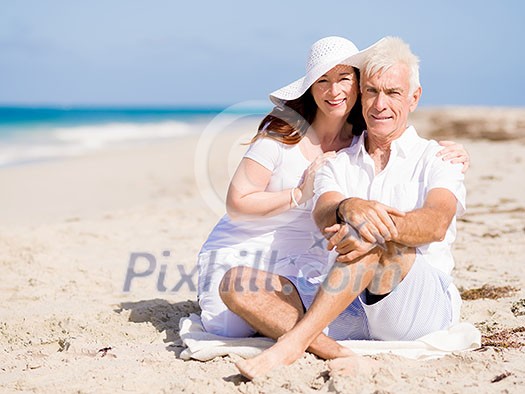 Happy couple together on the beach Happy couple together on the beach