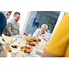 modern multiethnic muslim family enjoying eating iftar dinner together during a ramadan feast at home