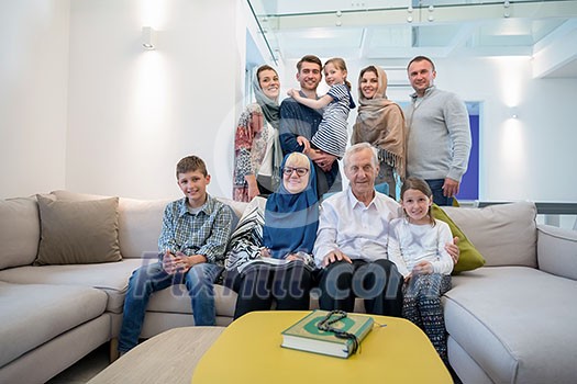 several generations portrait of happy modern muslim family before iftar dinner during ramadan feast at home several generations portrait of happy modern muslim family before iftar dinner during ramadan feast at home