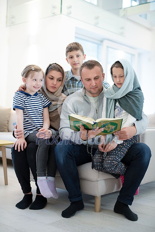 portrait of young happy modern muslim family before iftar dinner during ramadan feast at home portrait of young happy modern muslim family before iftar dinner during ramadan feast at home