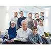 several generations portrait of happy modern muslim family before iftar dinner during ramadan feast at home