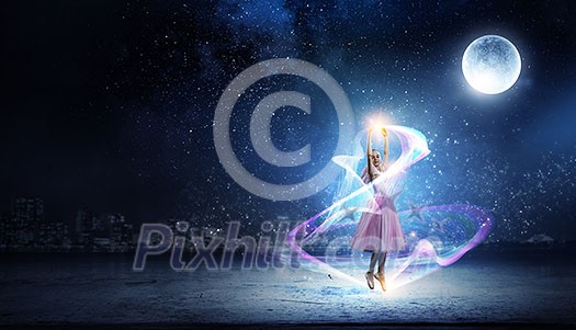 Ballerina kid girl in pink dress dancing. Mixed media Ballerina kid girl in pink dress dancing. Mixed media