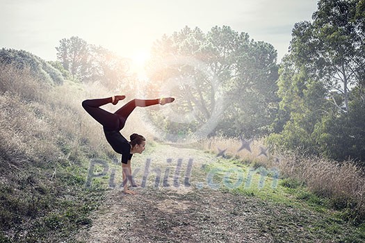 Young gymnast girl doing moves and jumps. Mixed media Young gymnast girl doing moves and jumps. Mixed media