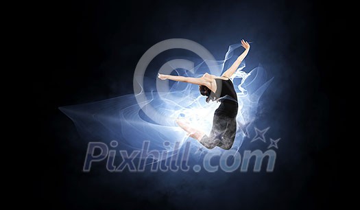 Young gymnast girl doing moves and jumps. Mixed media Young gymnast girl doing moves and jumps. Mixed media
