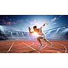 Athlete man running on racetrack at stadium. Mixed media