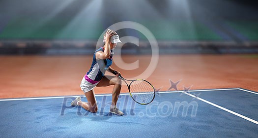 Pretty young woman playing tennis at playground. Mixed media Pretty young woman playing tennis at playground. Mixed media