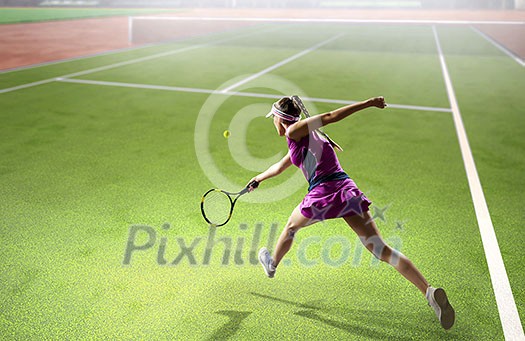 Pretty young woman playing tennis at playground. Mixed media Pretty young woman playing tennis at playground. Mixed media