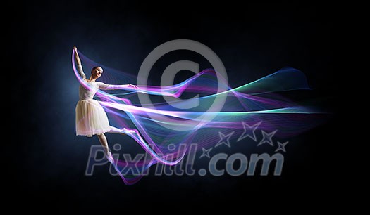 Elegant woman dancer in white dress against dark background Elegant woman dancer in white dress against dark background
