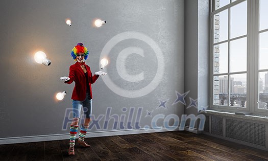 Woman with clown make up wearing wig juggling items . Mixed media Woman with clown make up wearing wig juggling items . Mixed media