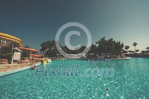 Beautiful tropical swimming pool in hotel resort for travel and vacation Beautiful tropical swimming pool in hotel resort for travel and vacation