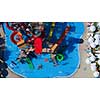 colorful water park aquapark water splash aerial top view of happy unidentified people and kids having fun and get relaxed