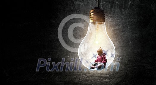 Happy child little girl reading book. Mixed media Happy child little girl reading book. Mixed media