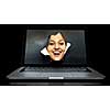 Face of young curious woman peeking through a hole in laptop screen. Mixed media