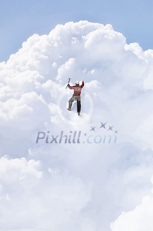 Alpinist man climbing white cloud high in sky. Mixed media Alpinist man climbing white cloud high in sky. Mixed media