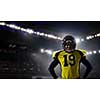 American football player in lights of stadium. Mixed media