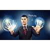 Portrait of businessman working with virtual panel interface. Mixed media