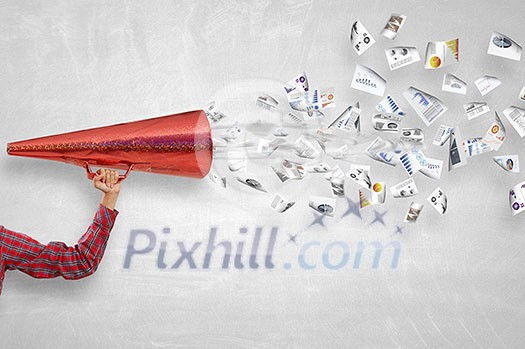 Close of woman making announcement in paper red trumpet Close of woman making announcement in paper red trumpet