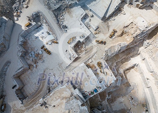 High stone mountain and marble quarries in the Apennines in Tuscany, Carrara Italy. Open marble mining. High stone mountain and marble quarries in the Apennines in Tuscany, Carrara Italy. Open marble mining.