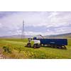 harvest time - combine machine loading harvested grain into the bunker of the truck