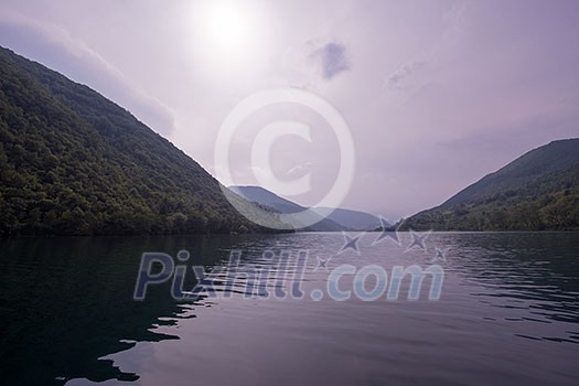 Nature conceptual image. Evening on the lake at beautiful summer nature