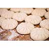balls of dough bread getting ready to be baked at professional bakery