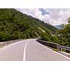 asphalt road in beautiful countryside on sunny summer day