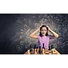 Young caucasian kid girl playing game of chess