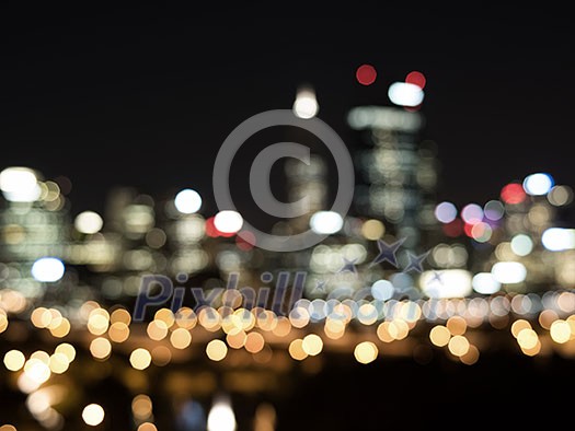 Blurred bokeh lights of night big city Blurred bokeh lights of night big city