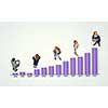 Top view of business people and graphs and diagrams on floor
