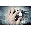 Hands of woman dialing numbers on safe padlock