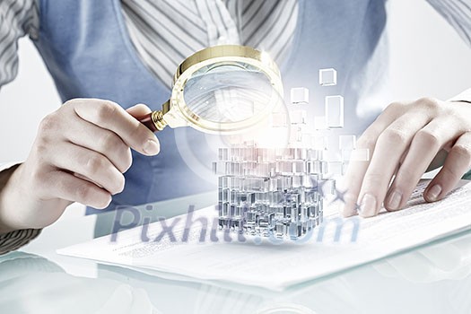 Hands of woman looking in magnifier at 3d illustration cube figure Hands of woman looking in magnifier at 3d illustration cube figure