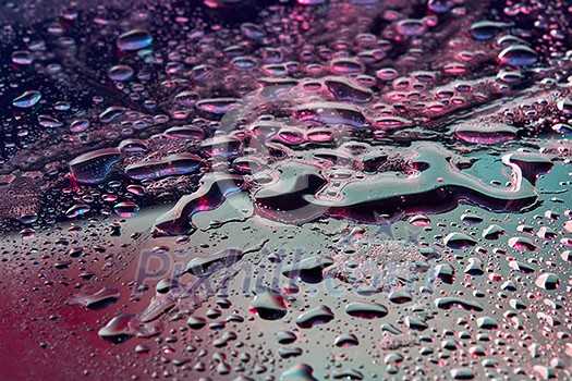 Fashionable background with UV effect lighting close-up water droplets. Trendy backdrop for your design. Fashionable background with UV effect lighting close-up water droplets. Trendy backdrop for your design.
