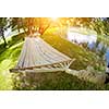 hammoc swing bed summer time in beautiful nature camp near river