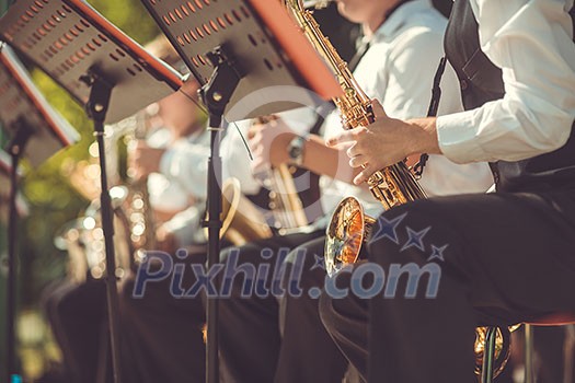 Jazz musicians playing the saxophone - Beautiful music / Jazz mood Concept Jazz musicians playing the saxophone - Beautiful music / Jazz mood Concept