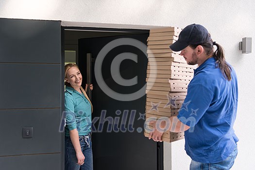 Pizza Delivery Man Giving Pizza Boxes To Smiling Young Woman Pizza Delivery Man Giving Pizza Boxes To Smiling Young Woman