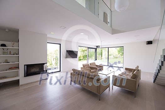 little cute girl enjoying on the stairs in a modern living room of her luxury home little cute girl enjoying on the stairs in a modern living room of her luxury home