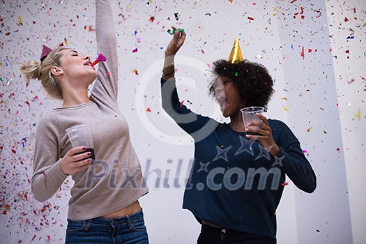 confetti party happy young people group celebrating new year eve while dancing and have fun at home confetti party happy young people group celebrating new year eve while dancing and have fun at home