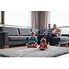 Happy Young Family Playing Together at home